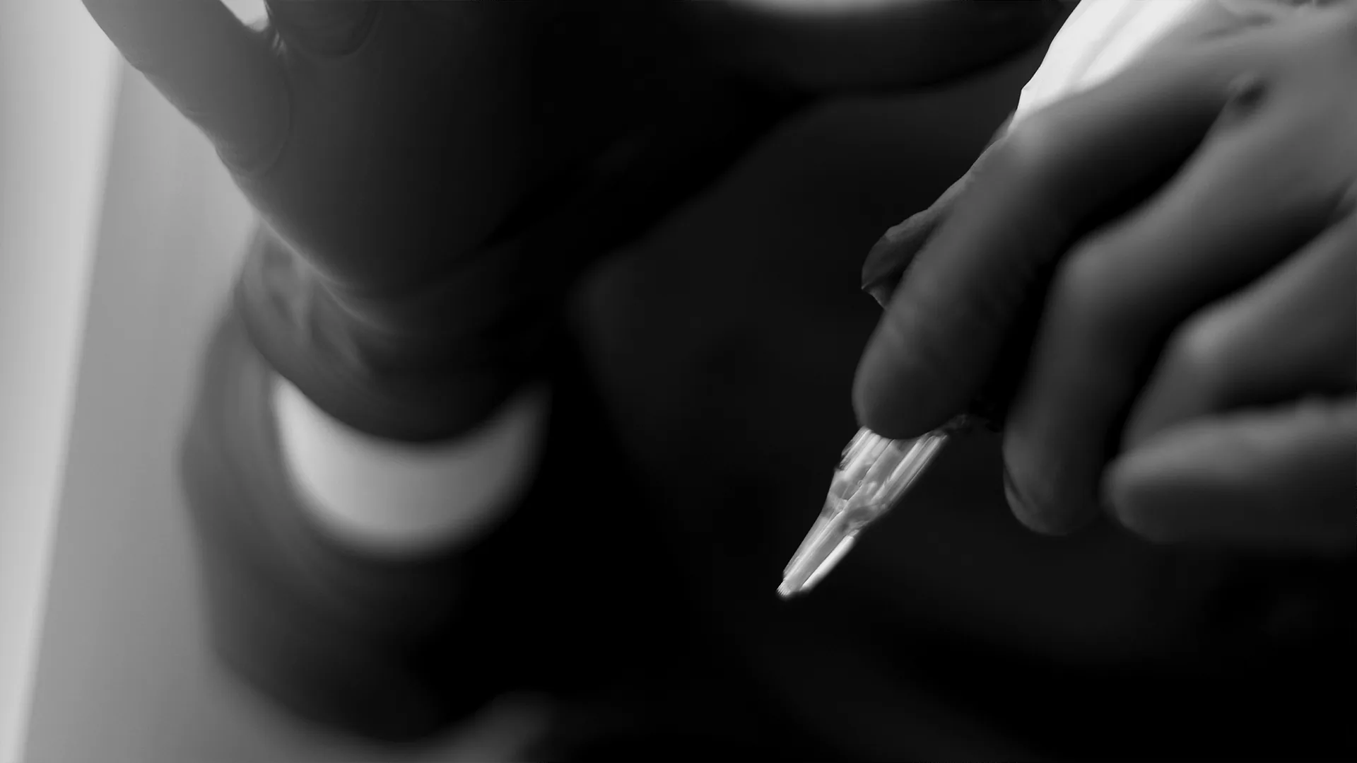 Natalia Mejia performing a precise paramedical tattoo treatment at her New York studio