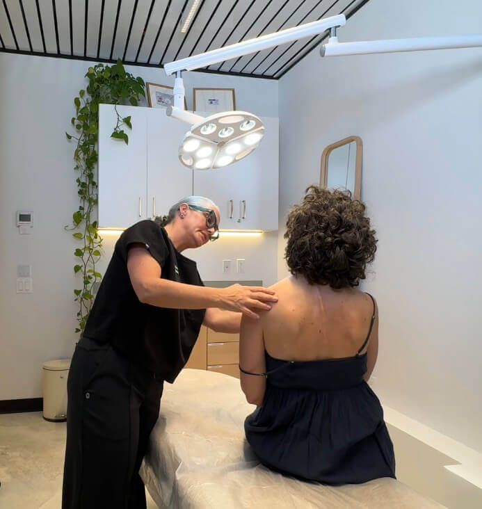 Scar Revision NYC — Natalia Mejia reviewing scar healing progress
